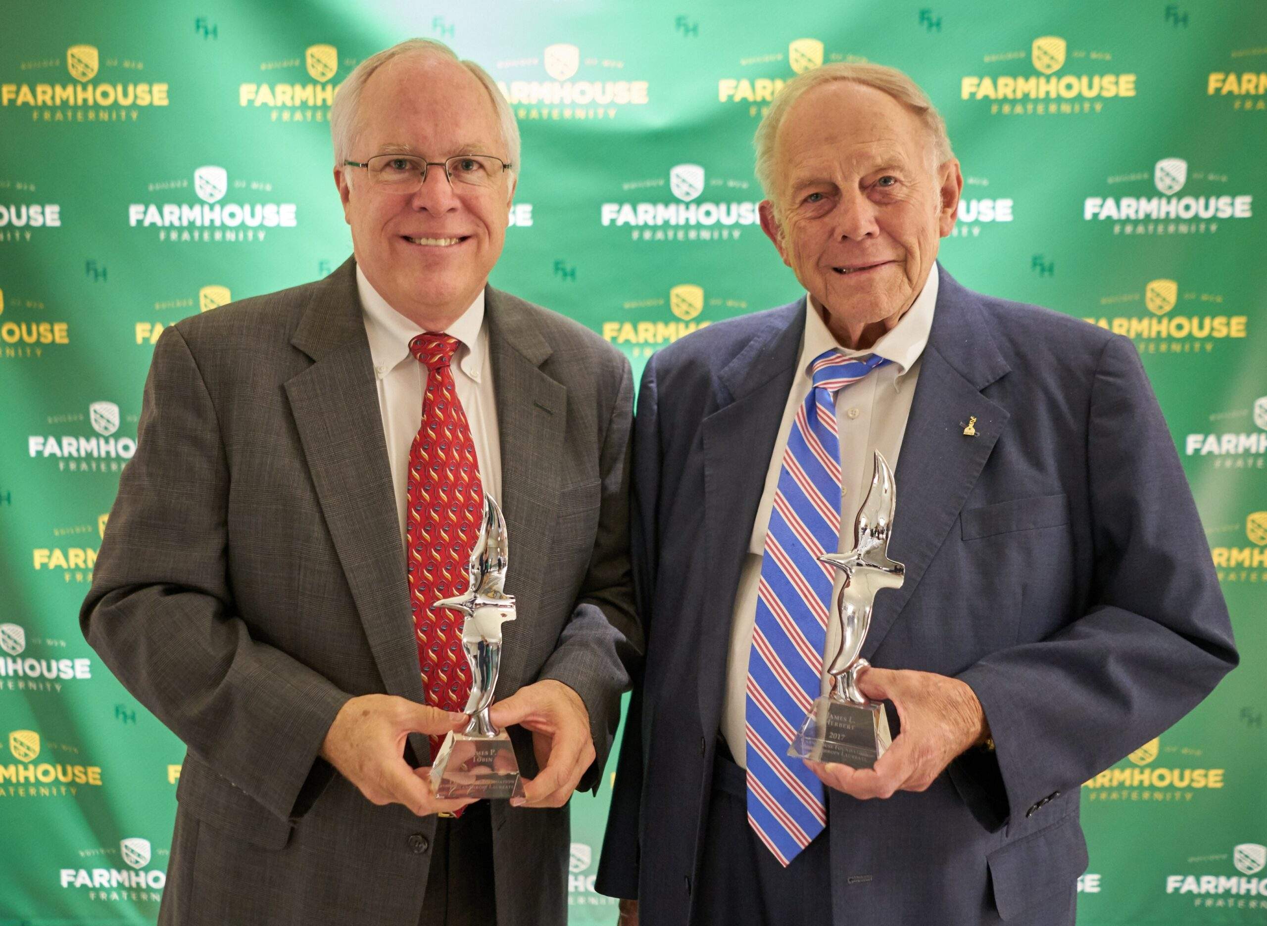 Jim Tobin (Iowa State 76) and Jim Herbert (Tennessee 61) receiving the Philanthropy Laureate Award together at the 2018 Conclave.